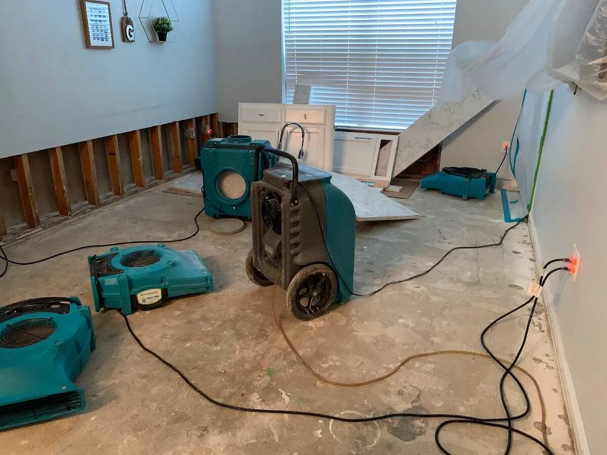 Dehumidifier in flood-cut room for Water Damage Restoration in Dunlap